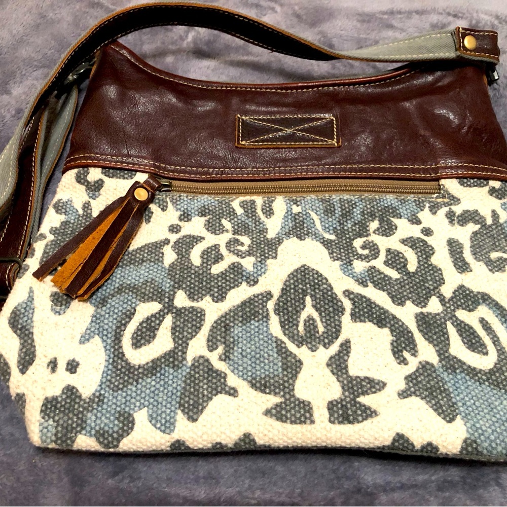 Myra bag, perfect condition. Mahogany leather accents!